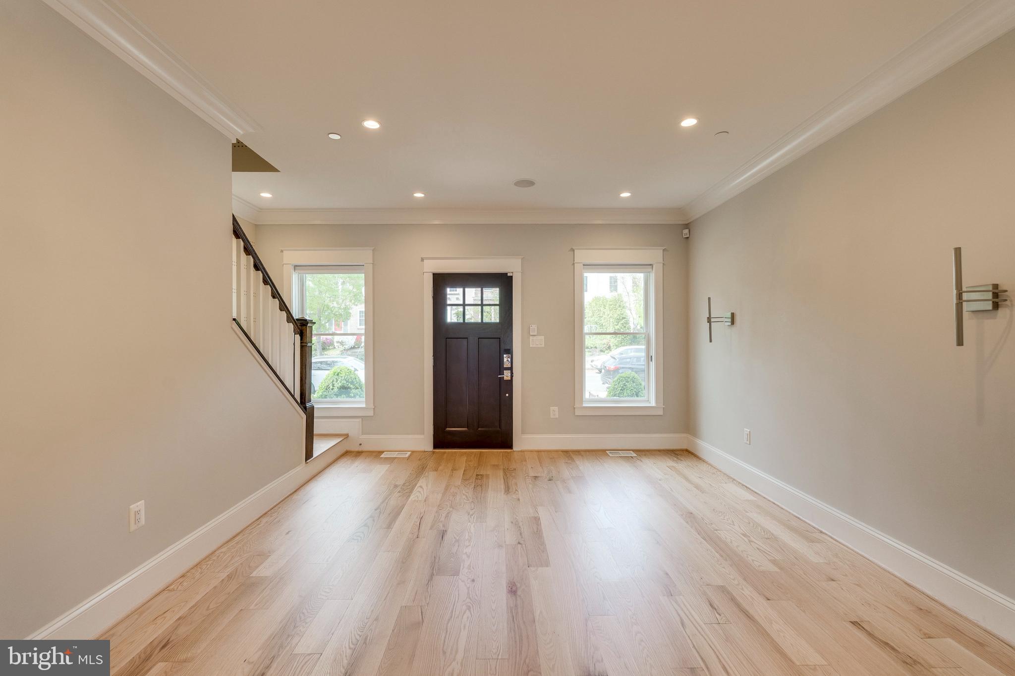 3616 T Street Northwest Washington, DC 20007 - Photo 3 of 49 a view of an empty room with wooden floor and a window
