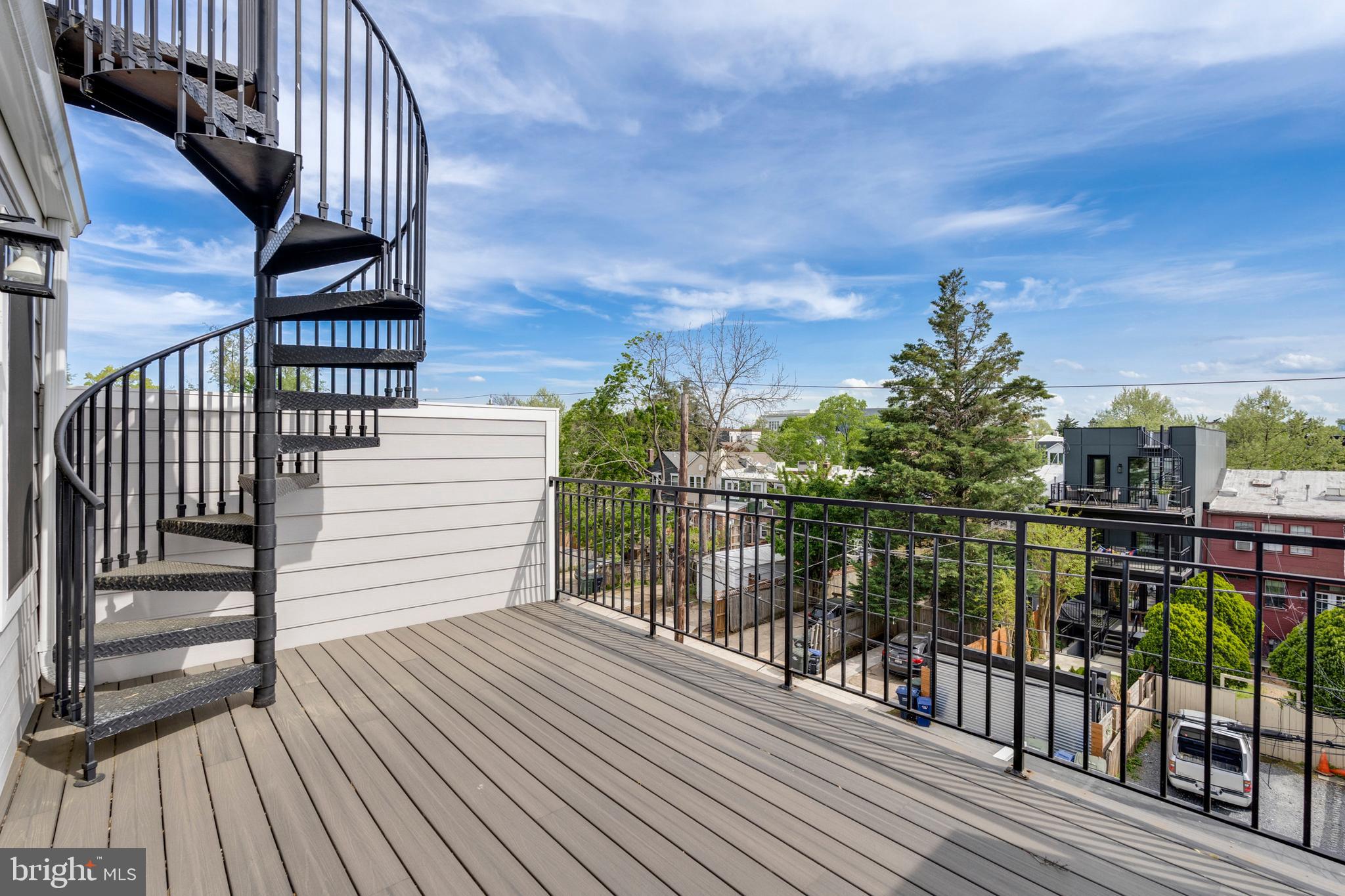 3616 T Street Northwest Washington, DC 20007 - Photo 37 of 49 a view of balcony with wooden floor and fence