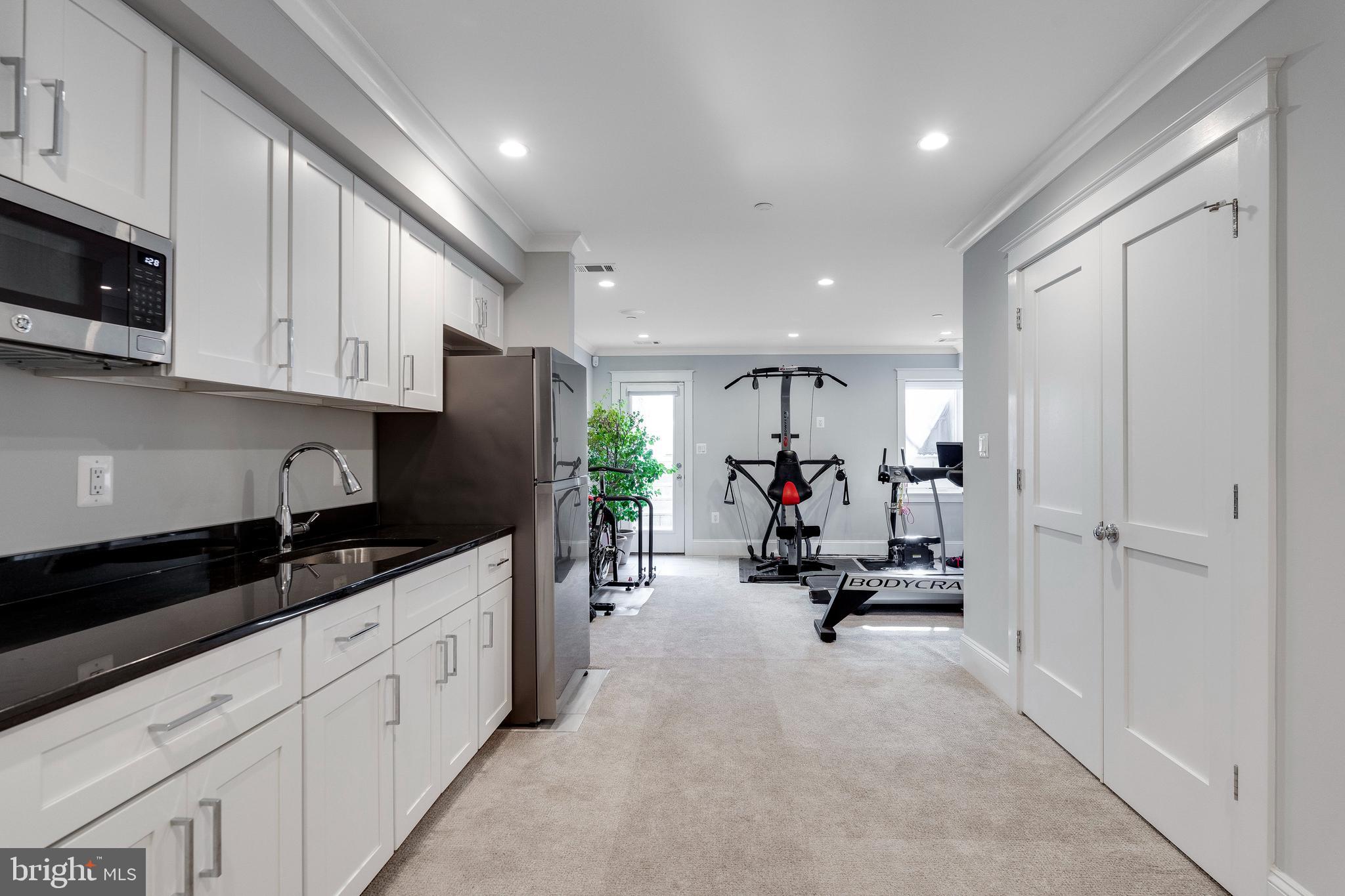 3616 T Street Northwest Washington, DC 20007 - Photo 40 of 49 a view of a kitchen with sink cabinets and a window