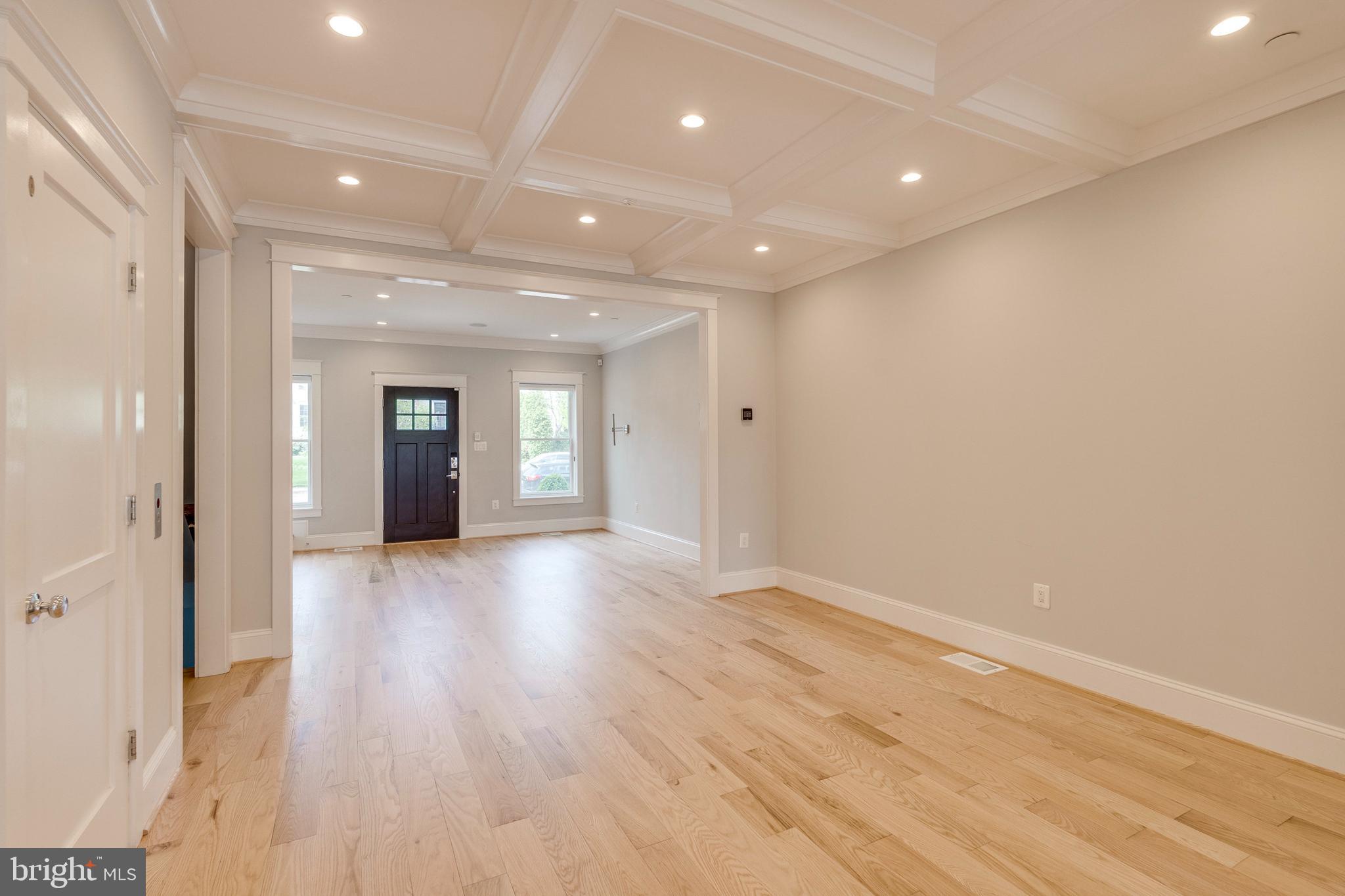 3616 T Street Northwest Washington, DC 20007 - Photo 4 of 49 an empty room with wooden floor and natural light