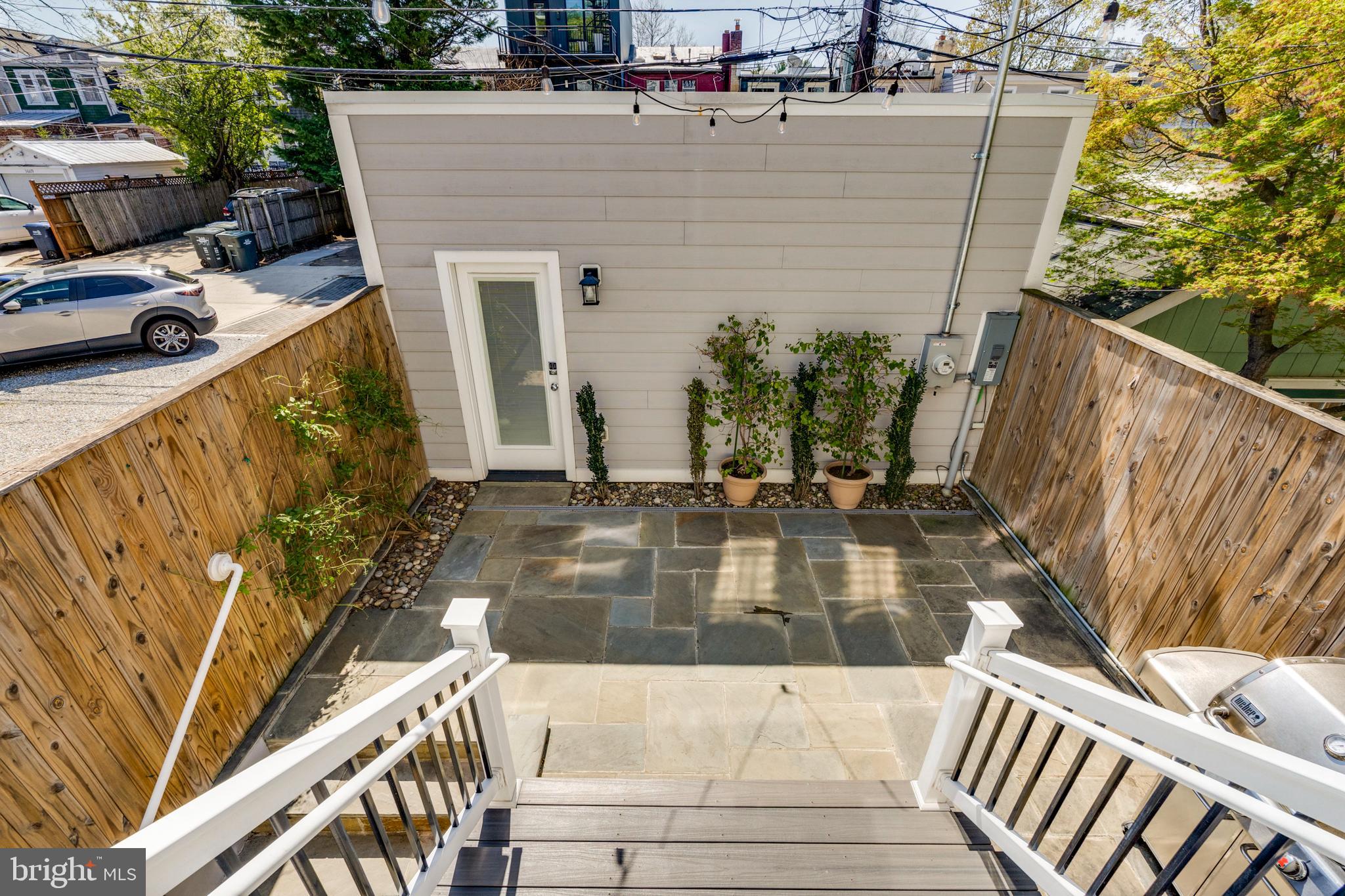 3616 T Street Northwest Washington, DC 20007 - Photo 46 of 49 a view of a balcony with floor to ceiling windows and wooden floor