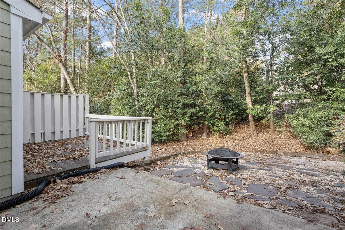 5867 Branchwood Road Raleigh, NC 27609 - Photo 13 of 24 a view of backyard and trees