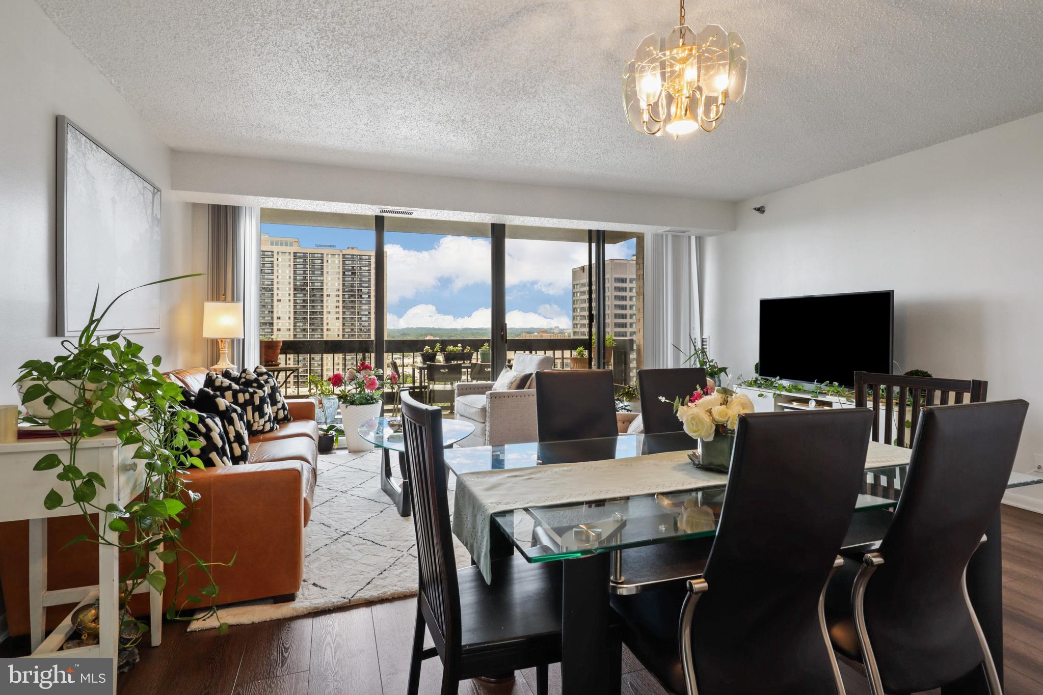 5505 Seminary Road, Unit 1306N Falls Church, VA 22041 - Photo 13 of 43 a view of a dining room with furniture window and outside view