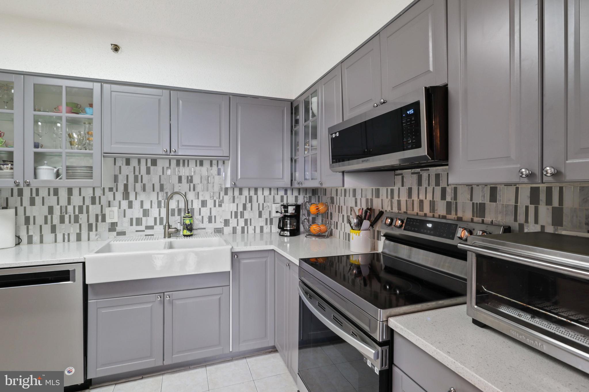 5505 Seminary Road, Unit 1306N Falls Church, VA 22041 - Photo 3 of 43 a kitchen with a sink stove and microwave