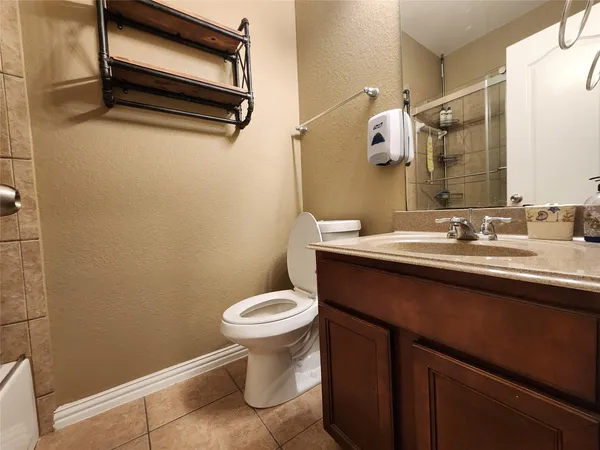 a bathroom with a sink and a toilet
