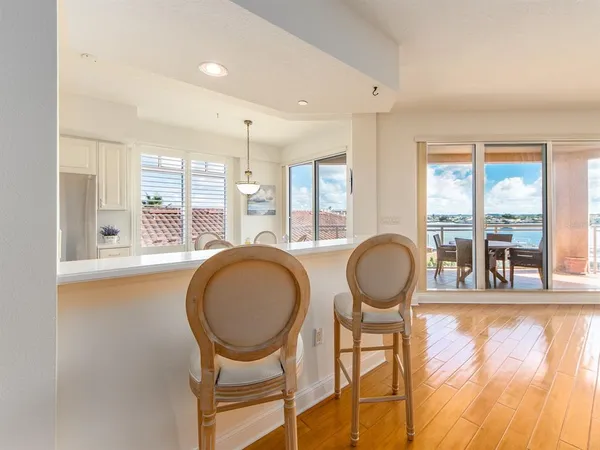 a room with furniture and a large window