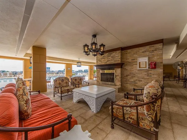 a large bathroom with a granite countertop double vanity and a mirror