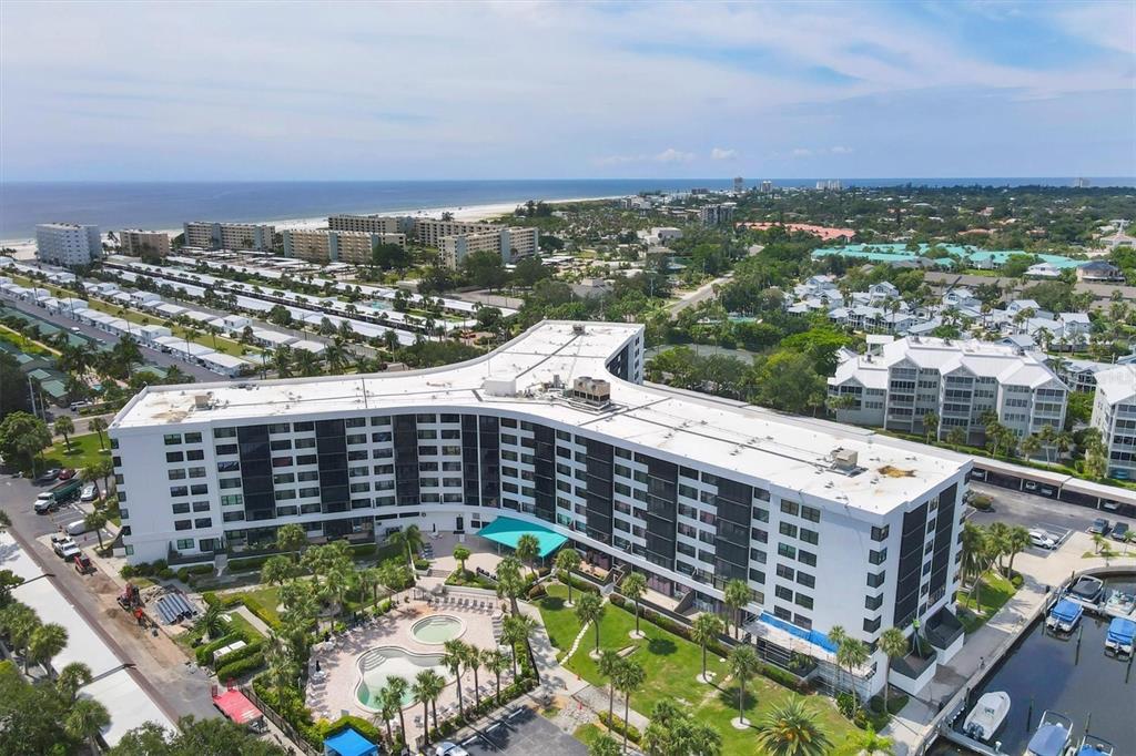 5855 Midnight Pass Road, Unit 420 Sarasota, FL 34242 - Photo 26 of 53 a view of a city with tall buildings