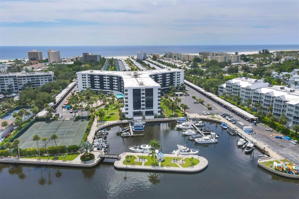 5855 Midnight Pass Road, Unit 420 Sarasota, FL 34242 - Photo 27 of 53 a view of a water with a terrace