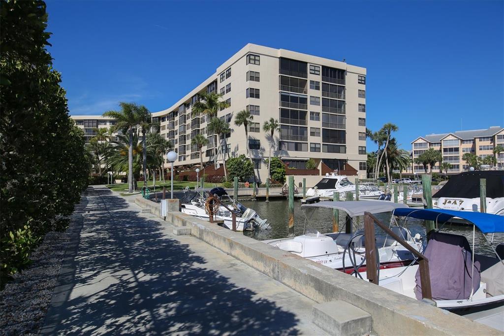 5855 Midnight Pass Road, Unit 420 Sarasota, FL 34242 - Photo 46 of 53 a building view with outdoor space