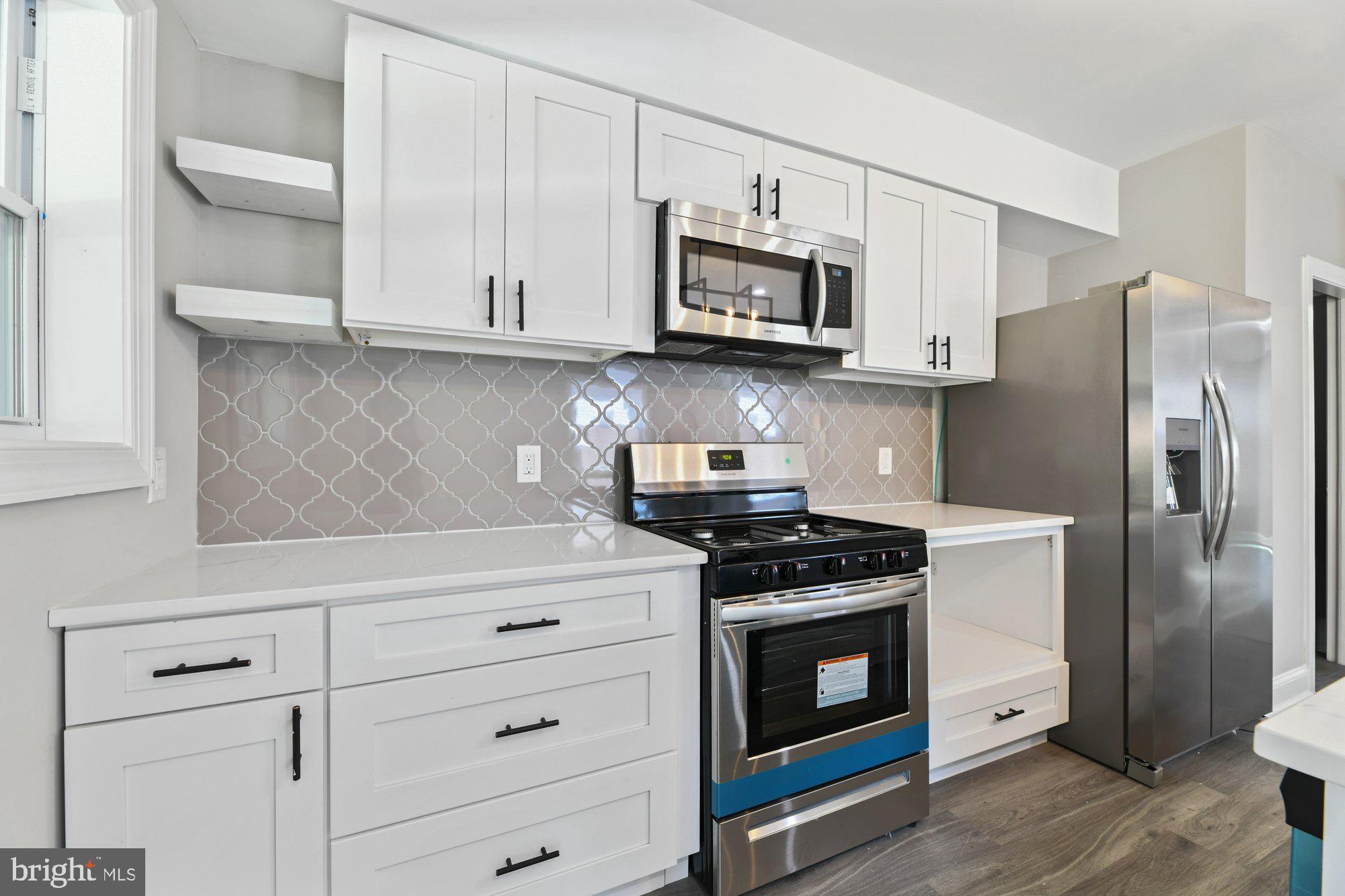 3714 Kimble Road Baltimore, MD 21218 - Photo 11 of 25 Classic Arabesque Mosaic Backsplash