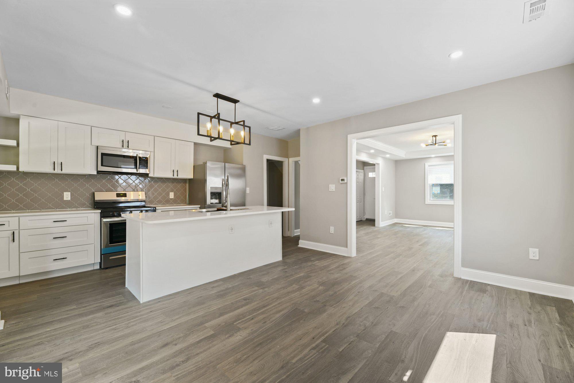 3714 Kimble Road Baltimore, MD 21218 - Photo 8 of 25 Spacious Dining Area w/ Island Seating