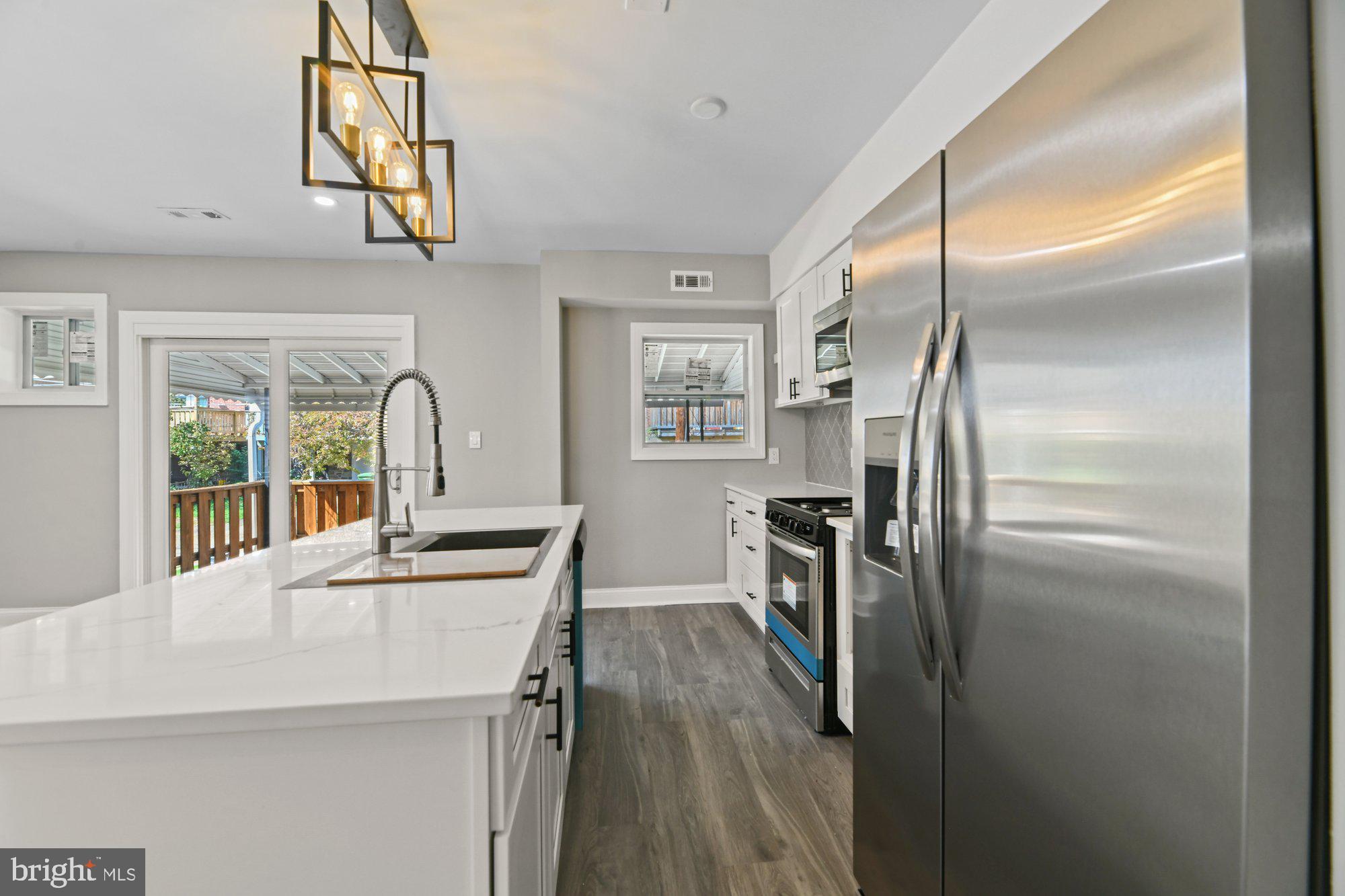 3714 Kimble Road Baltimore, MD 21218 - Photo 10 of 25 Center Island Creates Perfect Social Flow