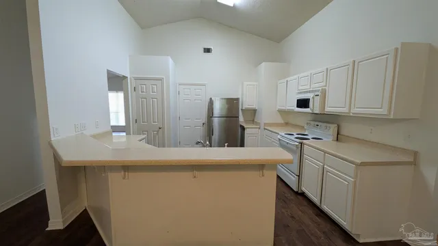 a room with window and a ceiling fan