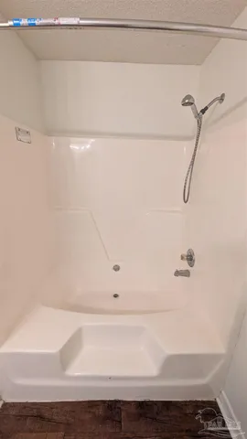 a bathroom with a bathtub