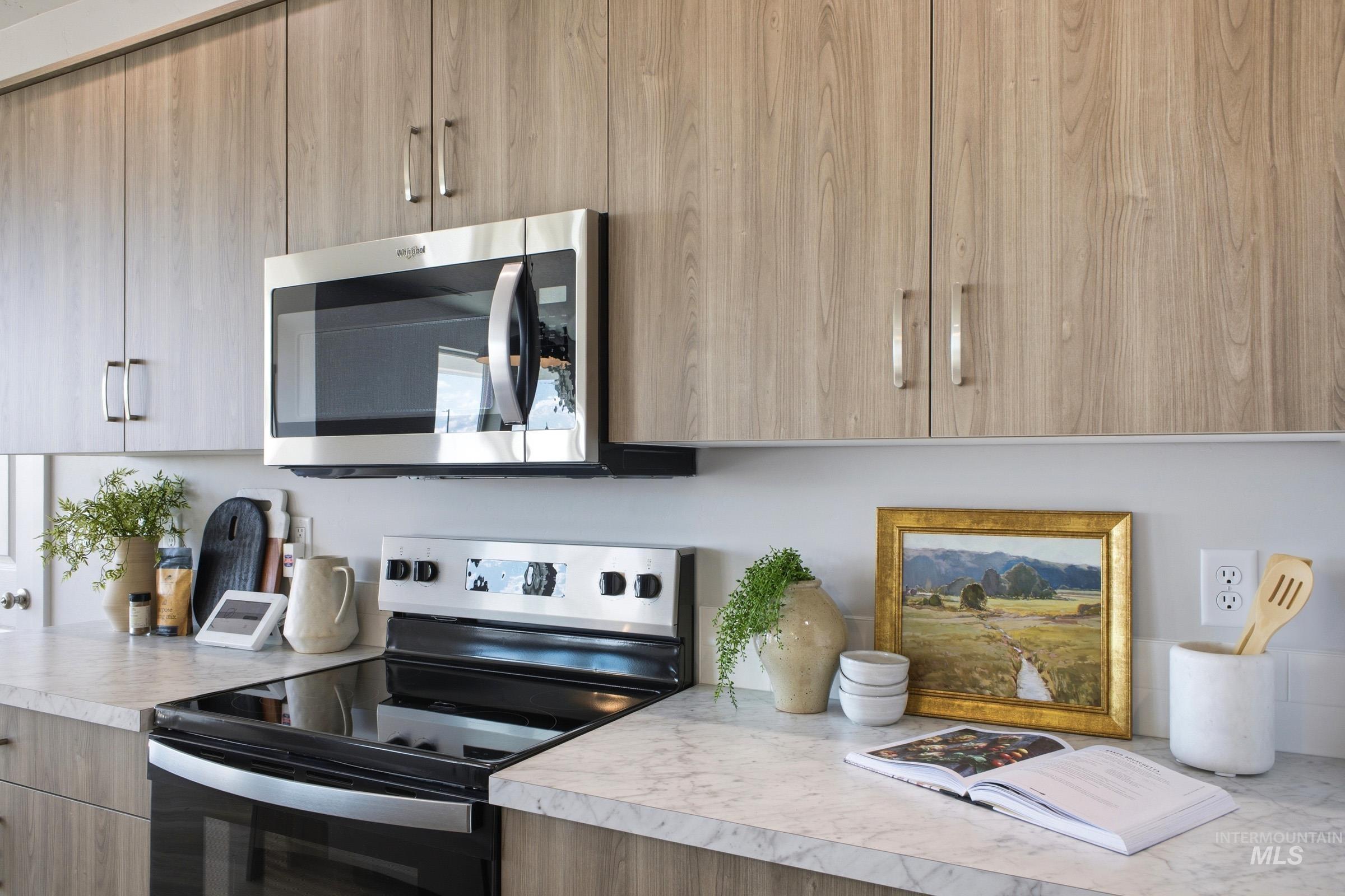 1641 Dyer Street Middleton, ID 83644 - Photo 16 of 29 Kitchen with stainless steel appliances, light countertops, and modern cabinets