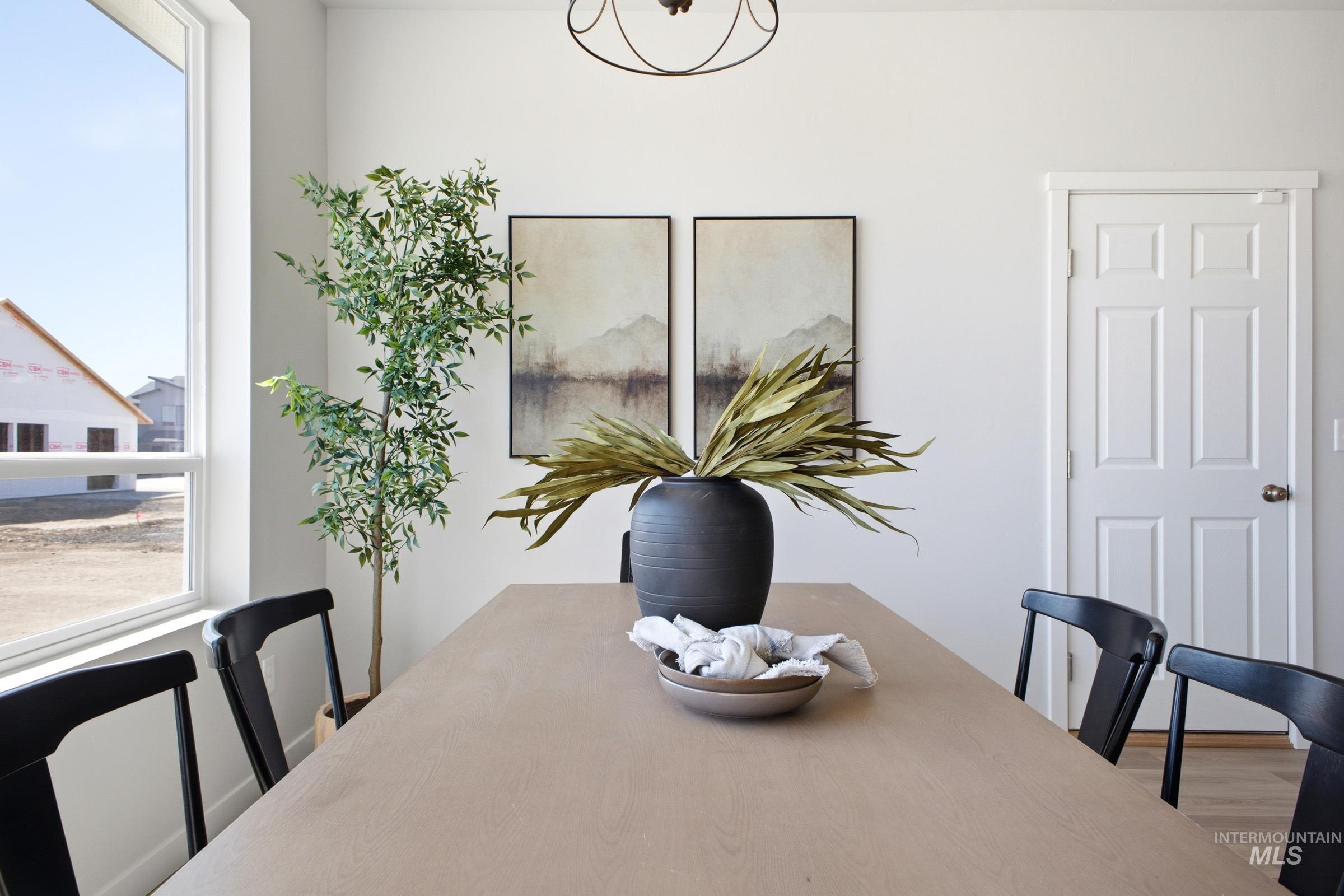 1641 Dyer Street Middleton, ID 83644 - Photo 18 of 29 Dining space with plenty of natural light and suspended lighting