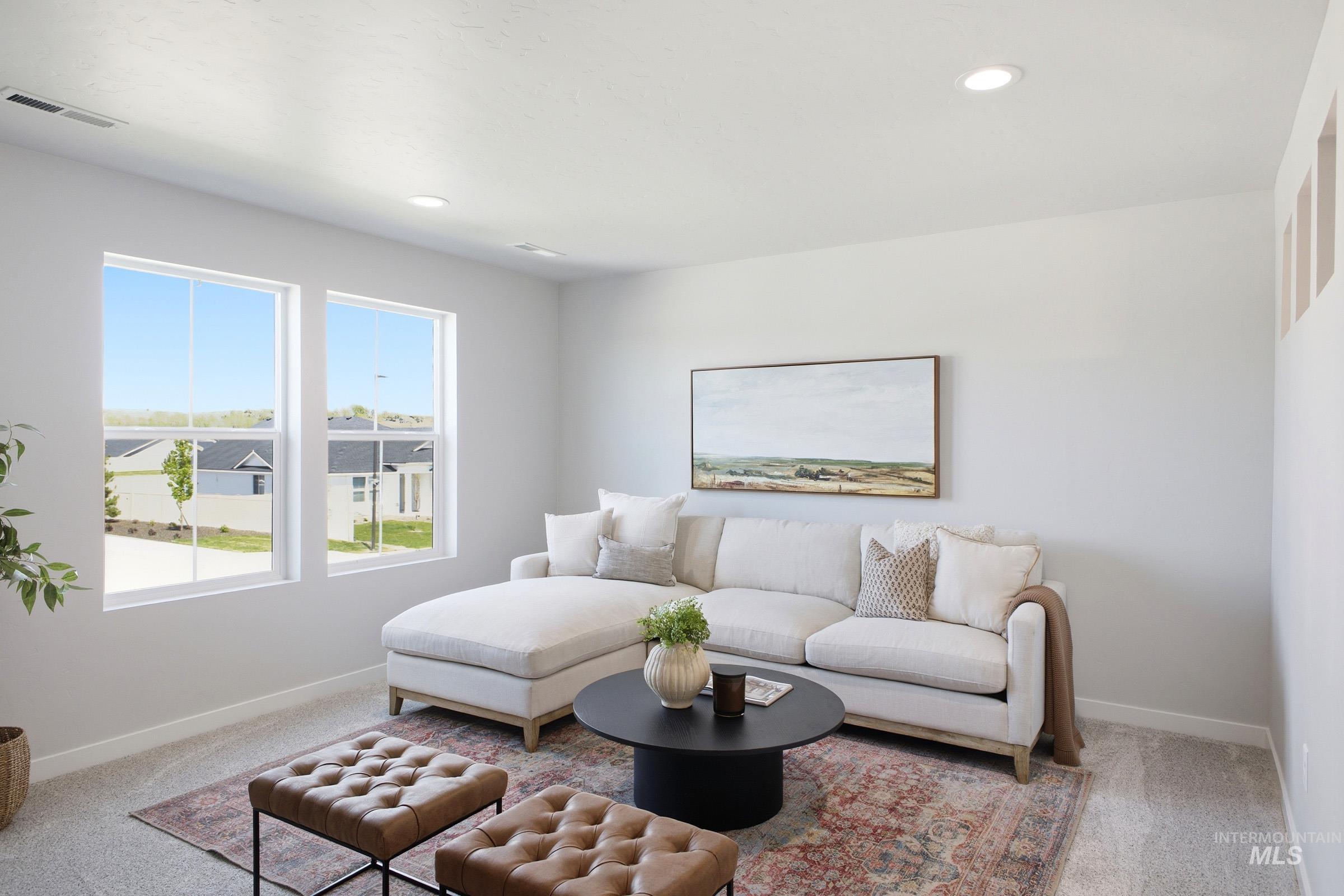 1641 Dyer Street Middleton, ID 83644 - Photo 20 of 29 Carpeted living room featuring baseboards and recessed lighting