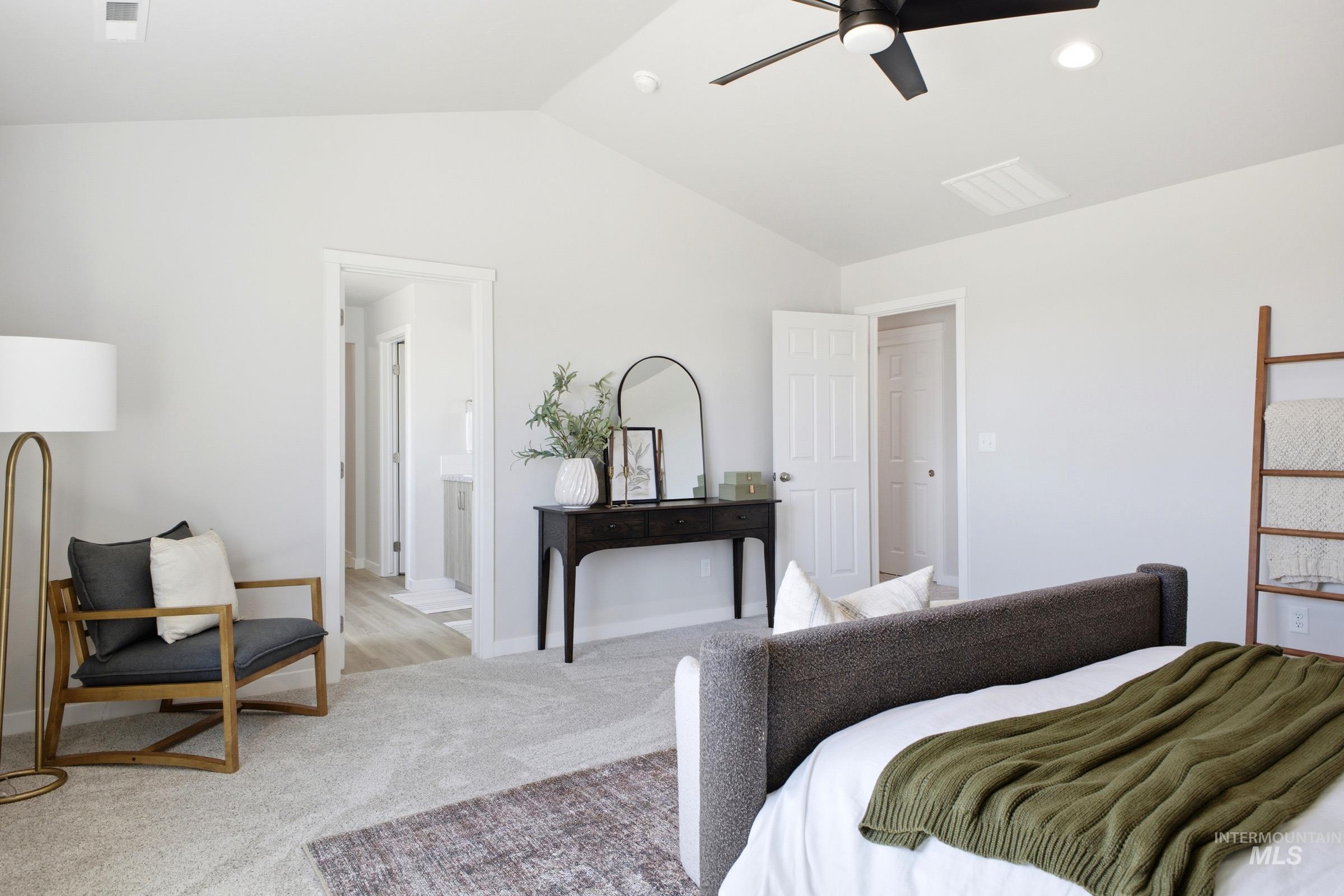 1641 Dyer Street Middleton, ID 83644 - Photo 26 of 29 Bedroom with light colored carpet, a ceiling fan, and connected bathroom