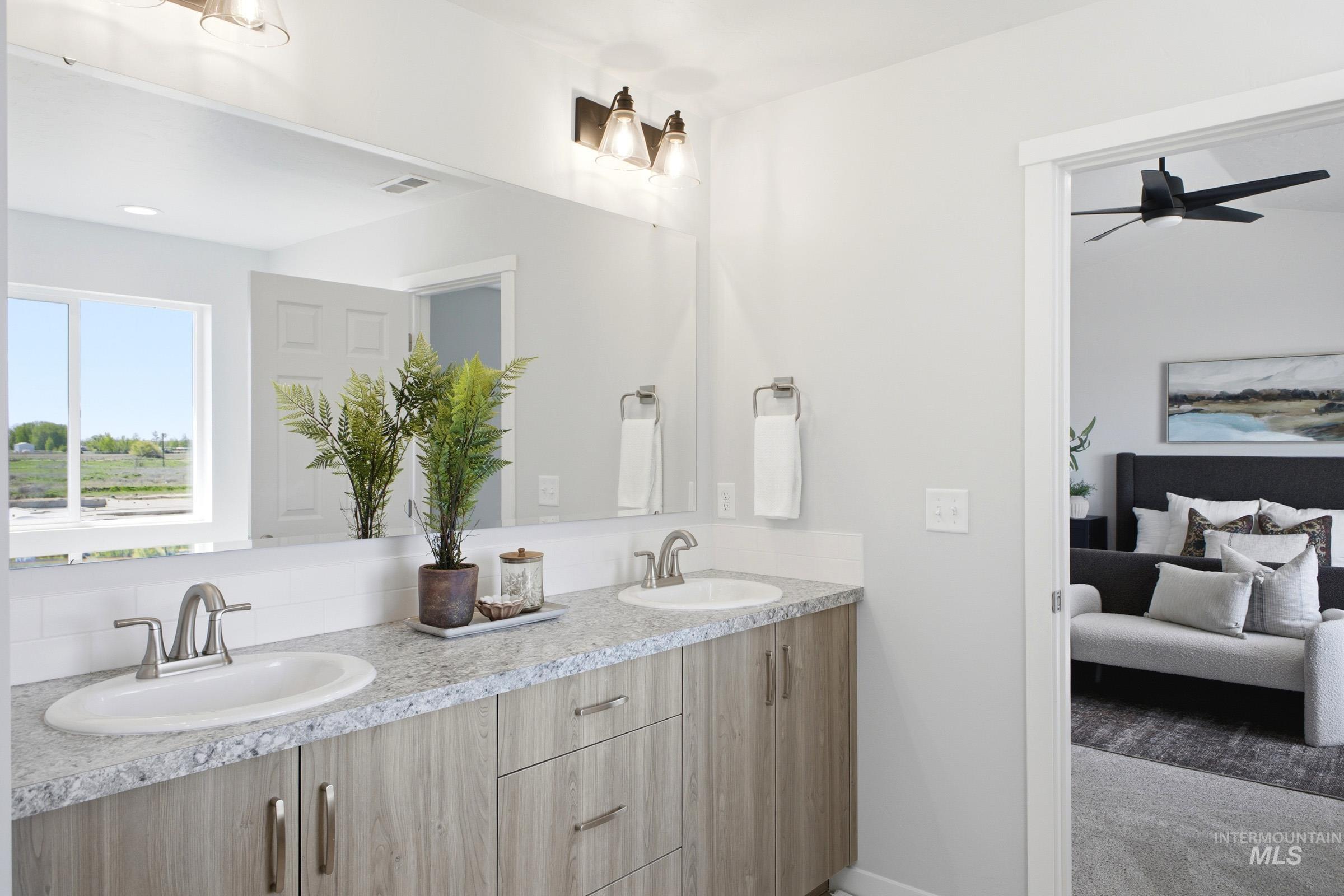 1641 Dyer Street Middleton, ID 83644 - Photo 27 of 29 Ensuite bathroom featuring double vanity and ceiling fan