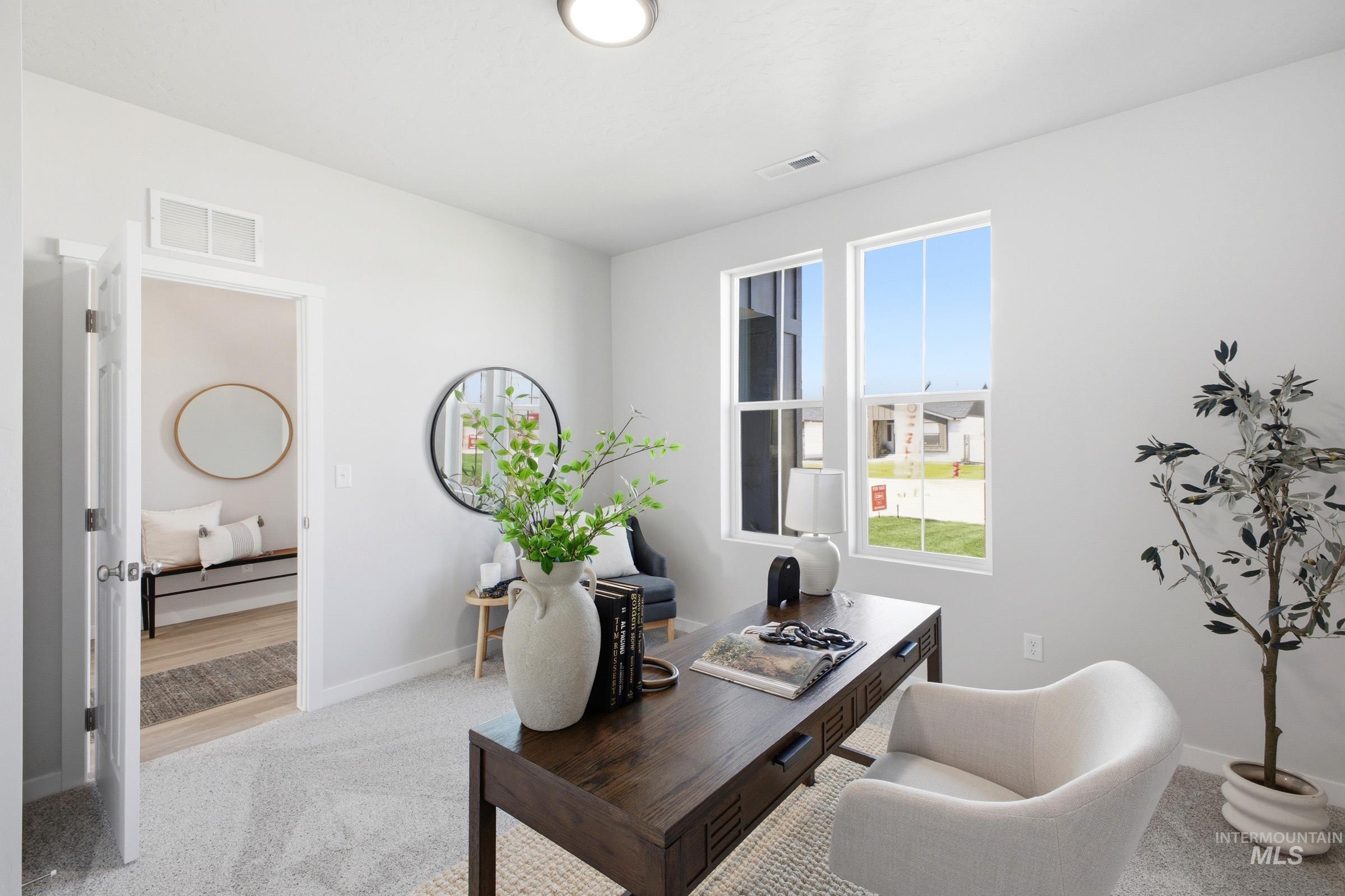 1641 Dyer Street Middleton, ID 83644 - Photo 4 of 29 Office space featuring light colored carpet and healthy amount of natural light