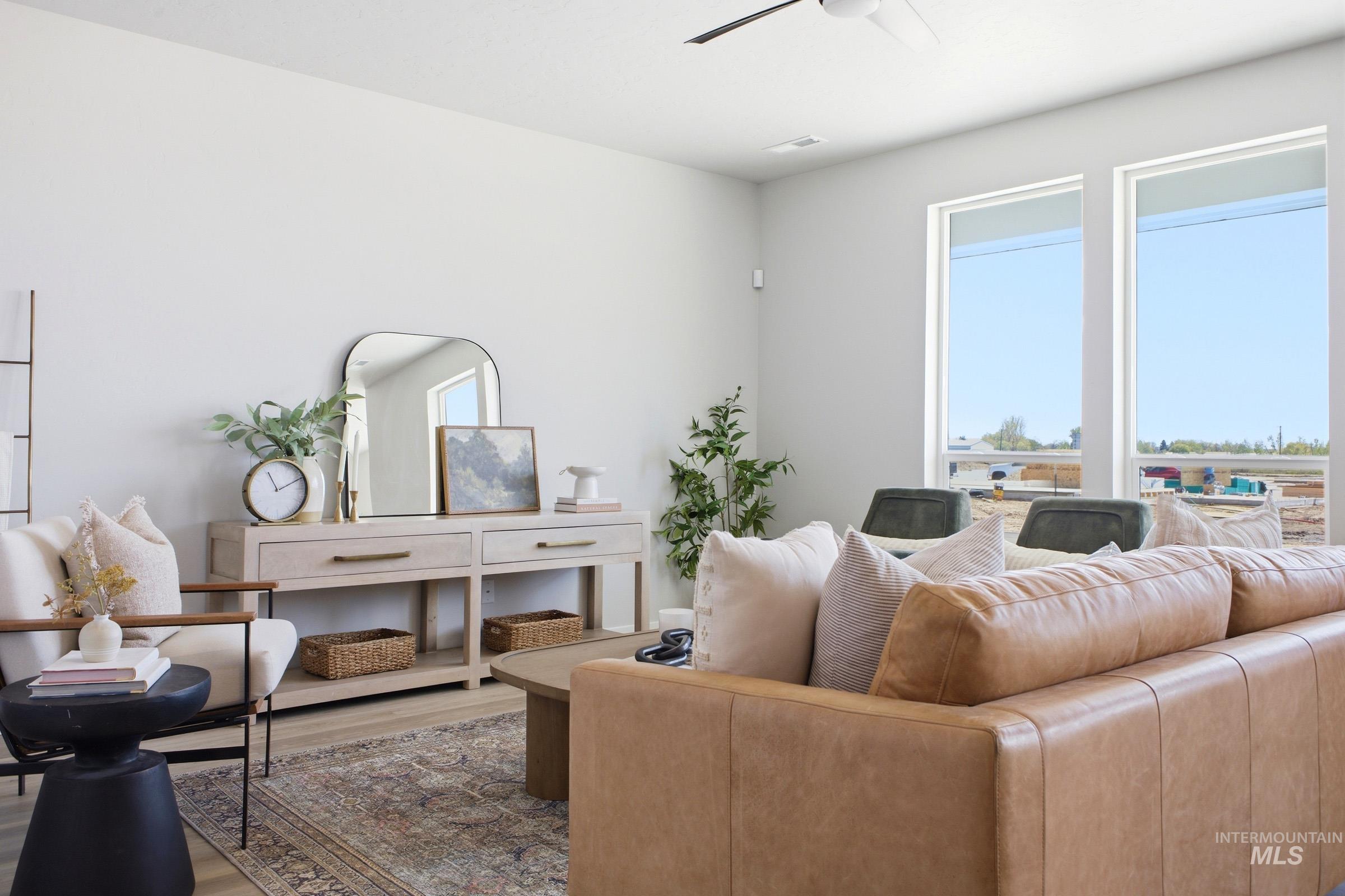 1641 Dyer Street Middleton, ID 83644 - Photo 6 of 29 Living area featuring wood finished floors and ceiling fan