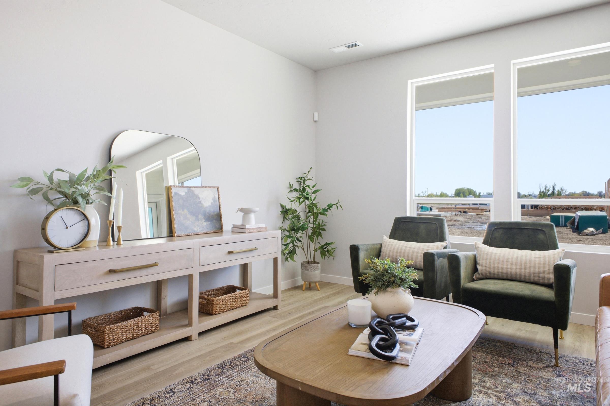 1641 Dyer Street Middleton, ID 83644 - Photo 7 of 29 Living area featuring wood finished floors