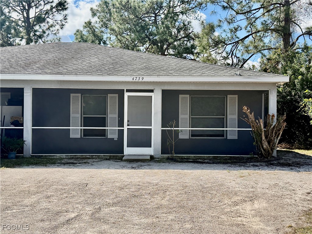 4739 28th Street Southwest Lehigh Acres, FL 33973 - Photo 1 of 16 a view of a front view of a house