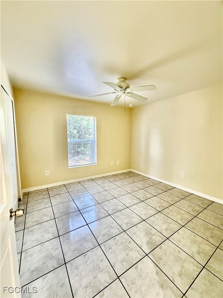 4739 28th Street Southwest Lehigh Acres, FL 33973 - Photo 11 of 14 a view of an empty room
