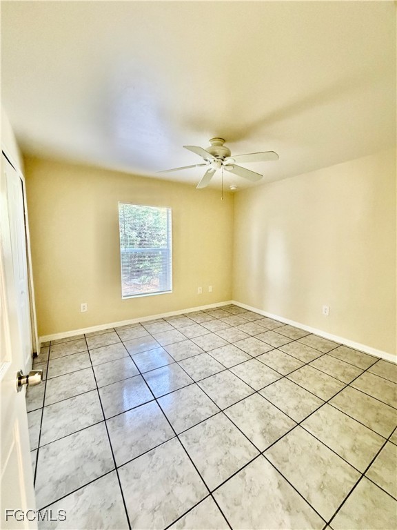 4739 28th Street Southwest Lehigh Acres, FL 33973 - Photo 13 of 16 a view of an empty room