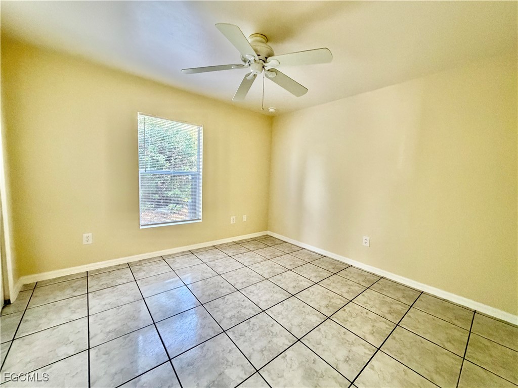 4739 28th Street Southwest Lehigh Acres, FL 33973 - Photo 9 of 14 a view of an empty room