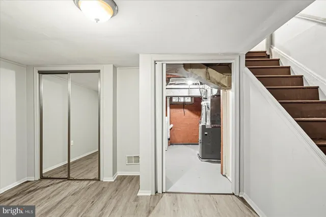 a view of a livingroom with wooden floor