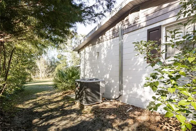 a view of yard with patio
