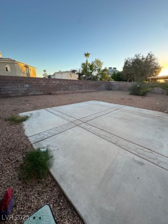 713 Rusty Spur Drive Henderson, NV 89014 - Photo 14 of 15 Patio terrace at dusk with a fenced backyard and a patio