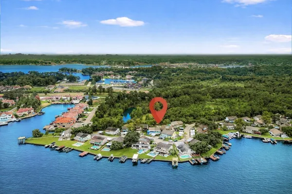 an aerial view of a house with a garden