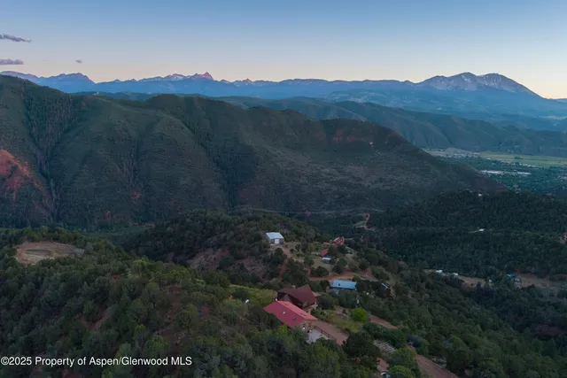 a view of a house with a mountain