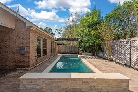 a view of backyard with green space