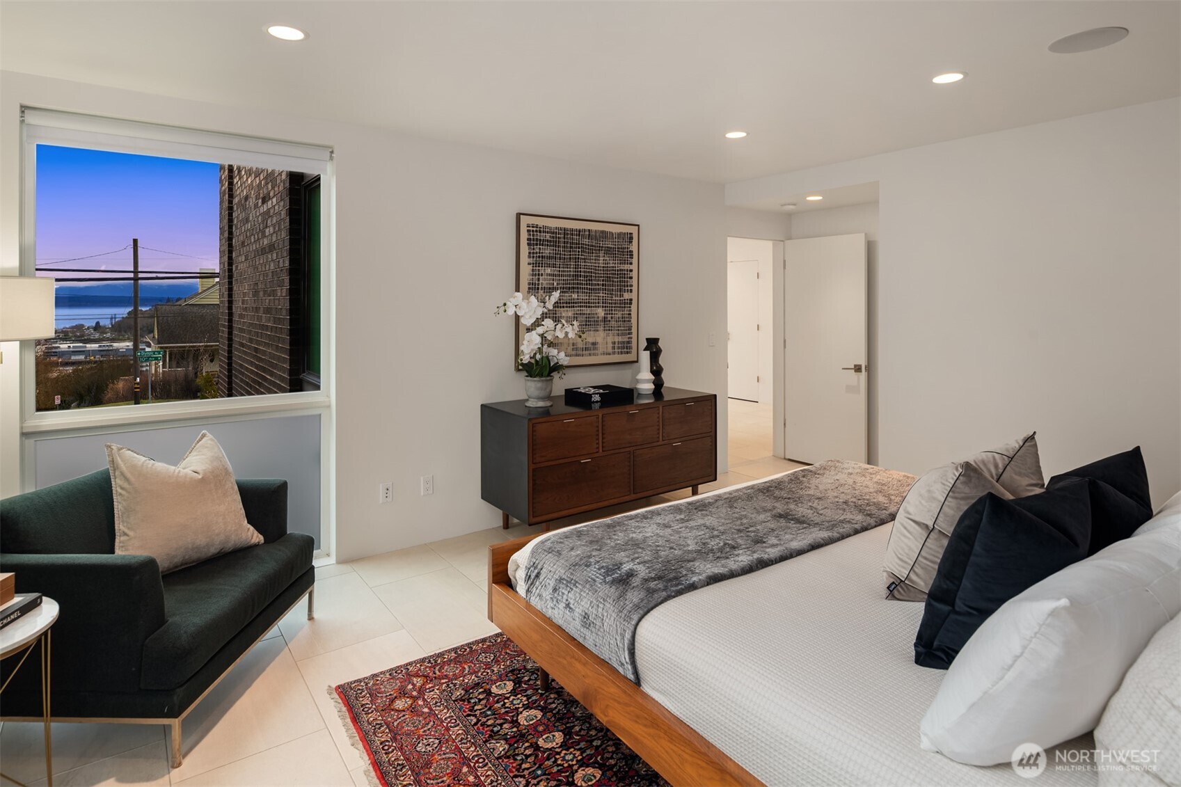 1400 Olympic Way West Seattle, WA 98119 - Photo 13 of 40 a bedroom with a bed and dresser