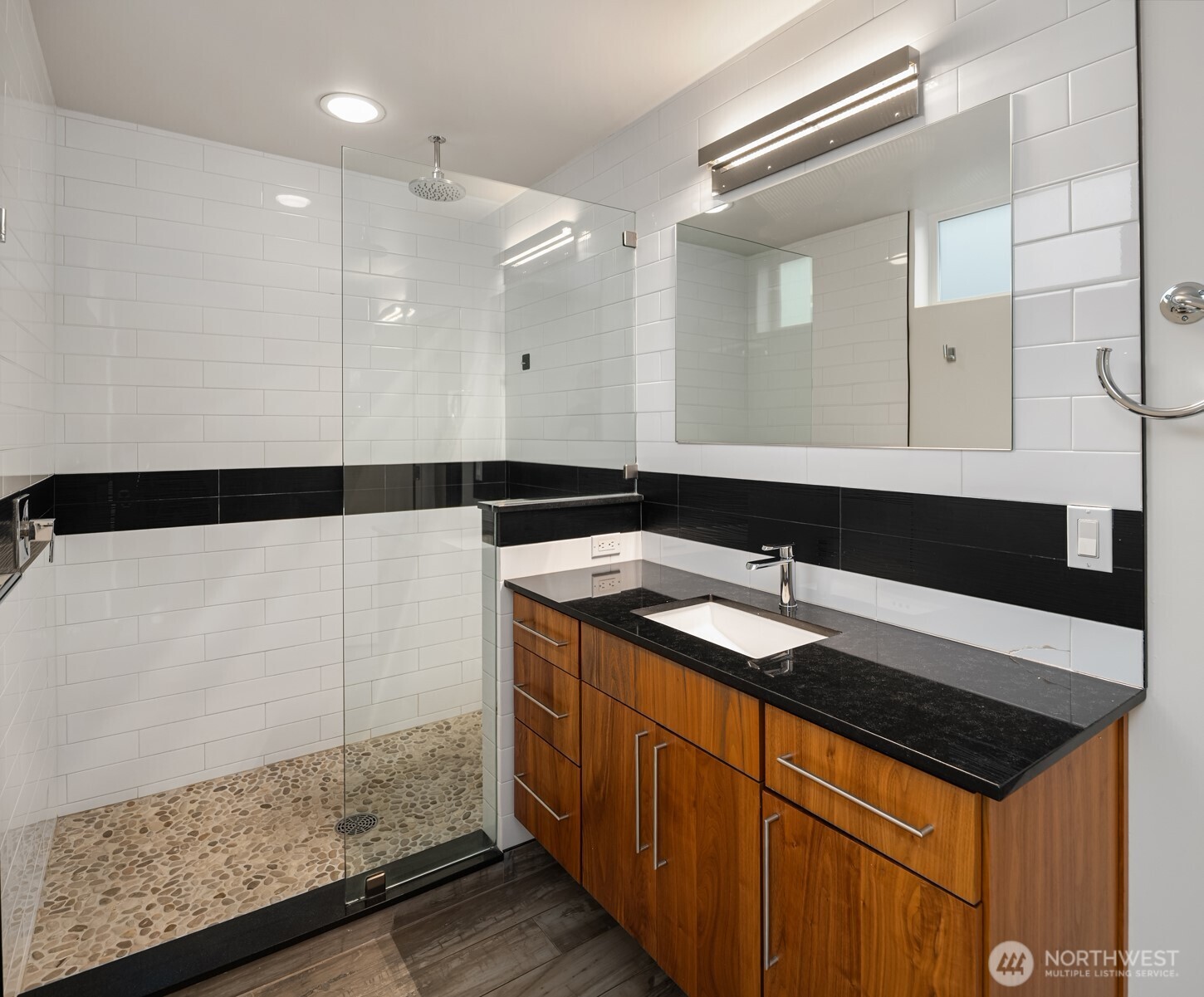 1400 Olympic Way West Seattle, WA 98119 - Photo 17 of 40 a bathroom with a sink and a mirror