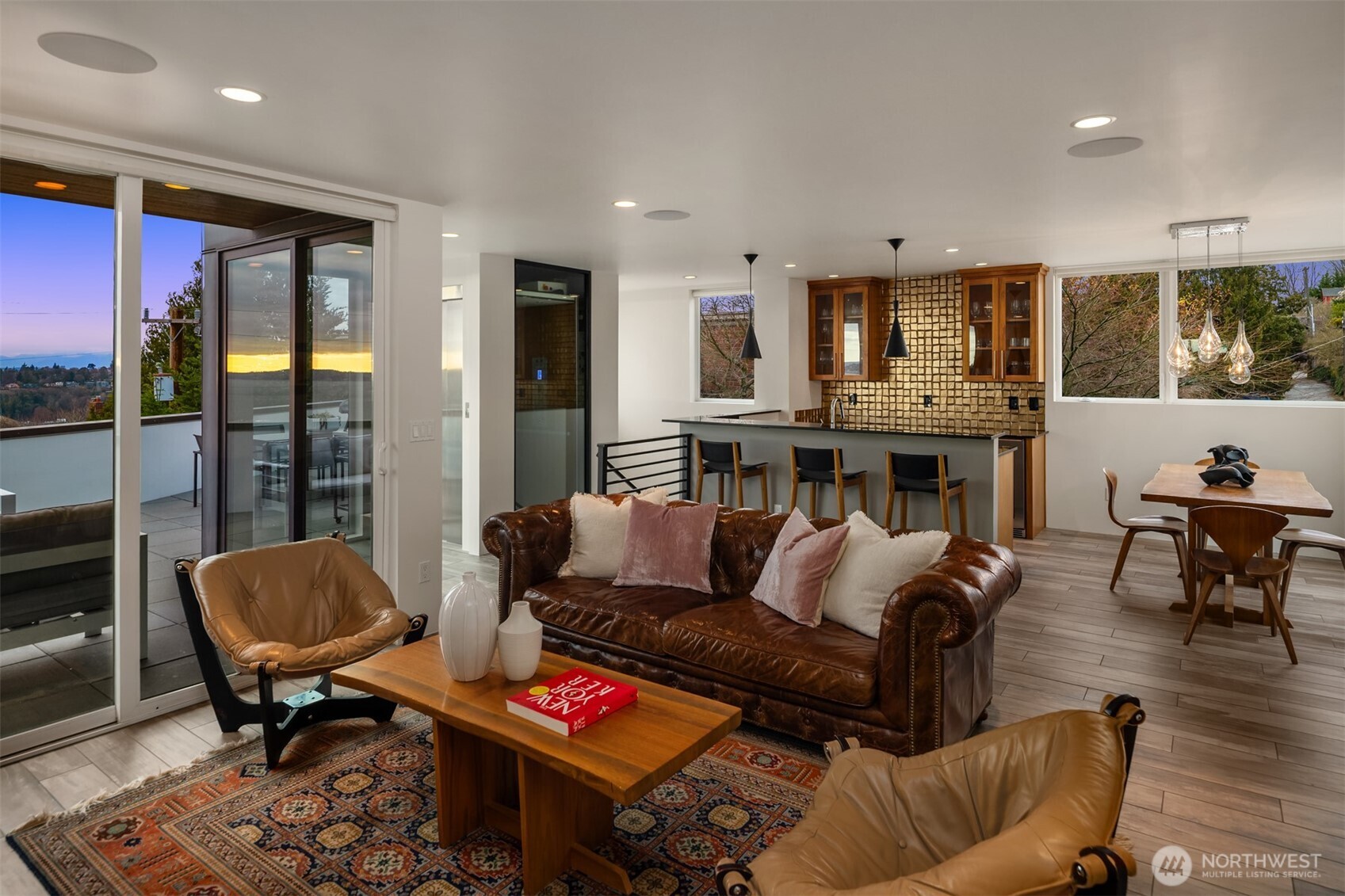 1400 Olympic Way West Seattle, WA 98119 - Photo 19 of 40 a living room with furniture and a fireplace
