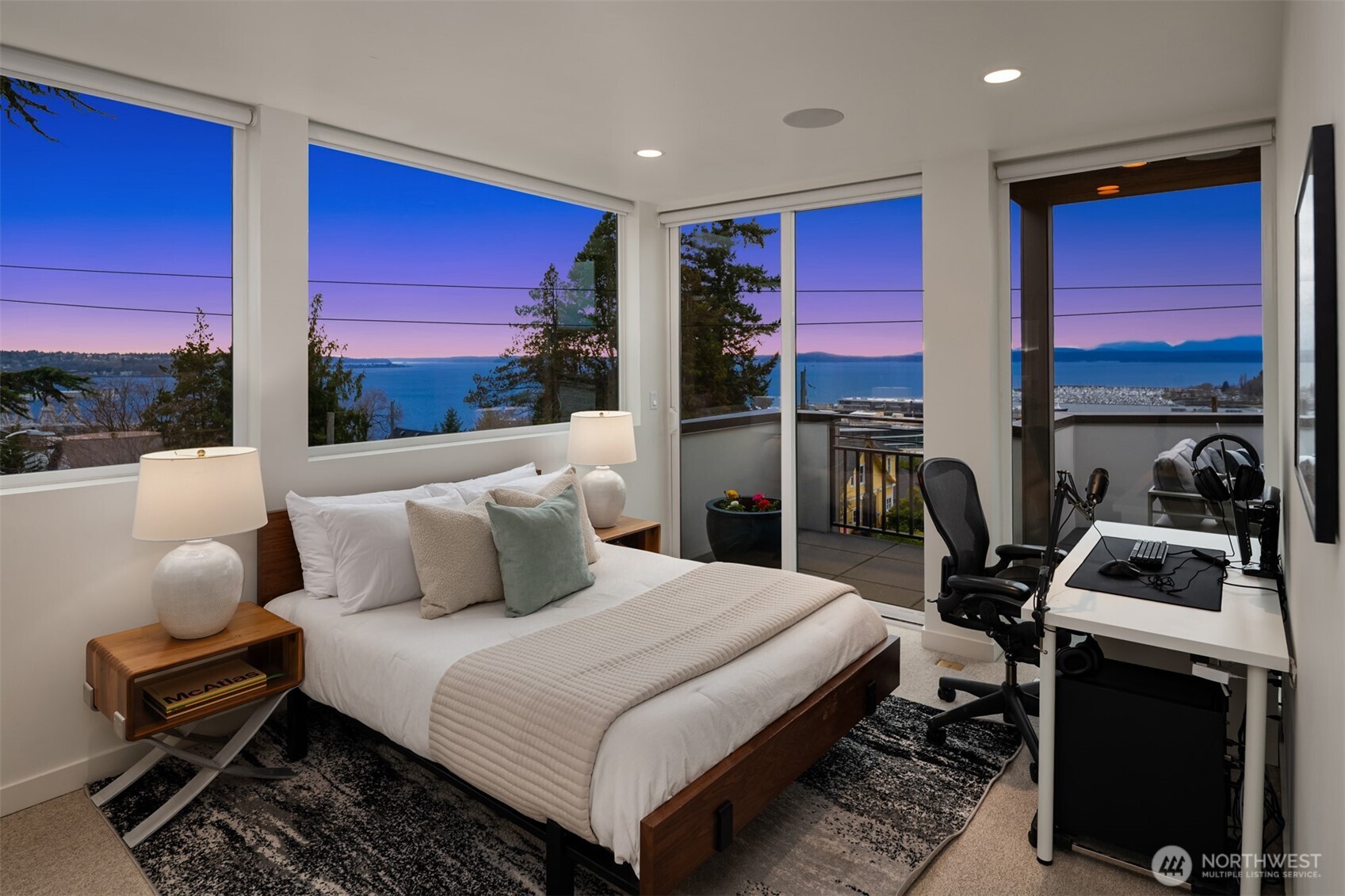 1400 Olympic Way West Seattle, WA 98119 - Photo 25 of 40 a bedroom with two beds and a flat screen tv