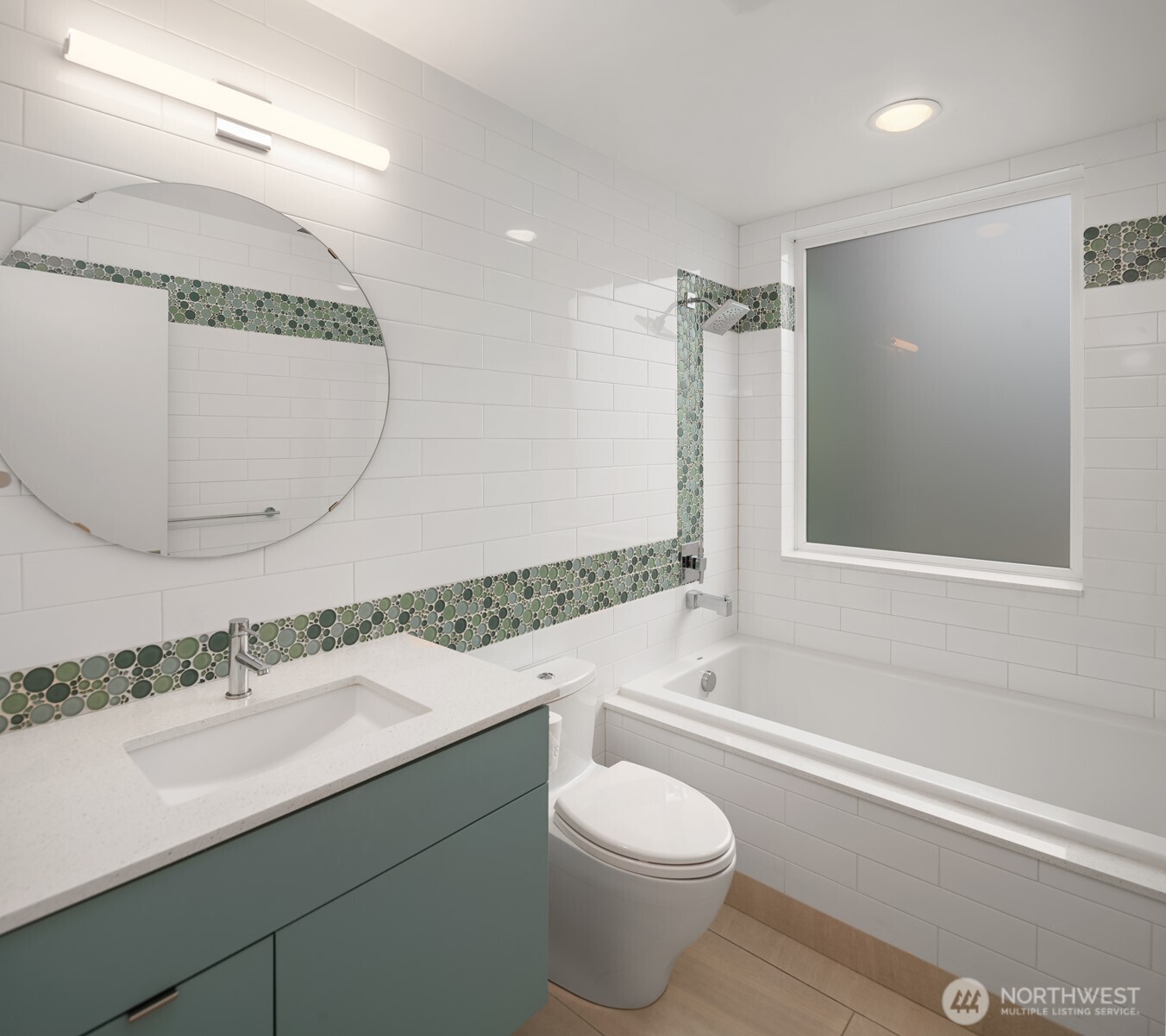 1400 Olympic Way West Seattle, WA 98119 - Photo 28 of 40 a bathroom with a sink and a mirror