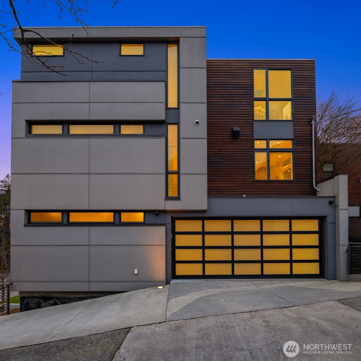 1400 Olympic Way West Seattle, WA 98119 - Photo 35 of 40 a view of a house with large windows
