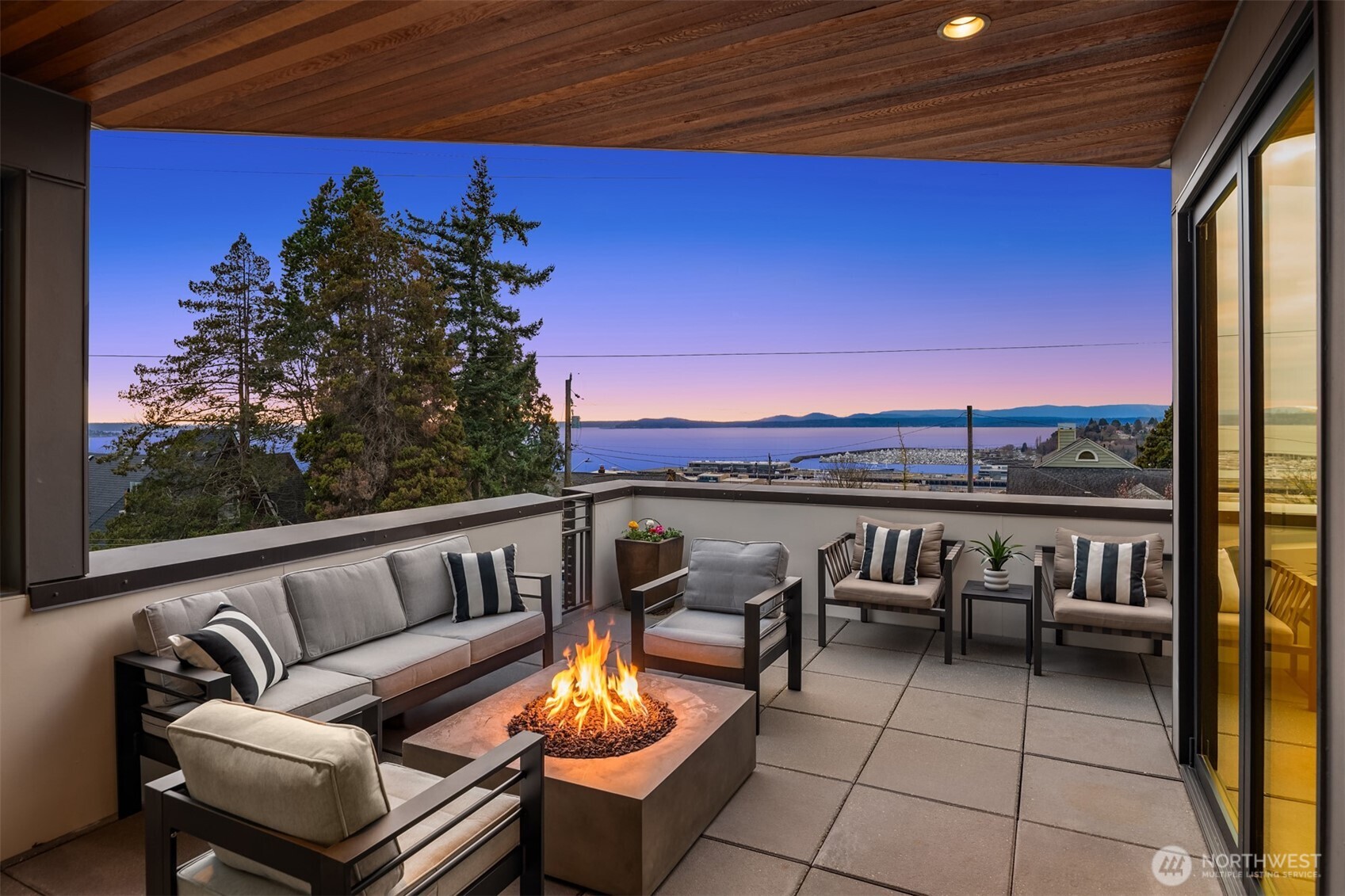 1400 Olympic Way West Seattle, WA 98119 - Photo 4 of 40 a terrace with outdoor seating and city view