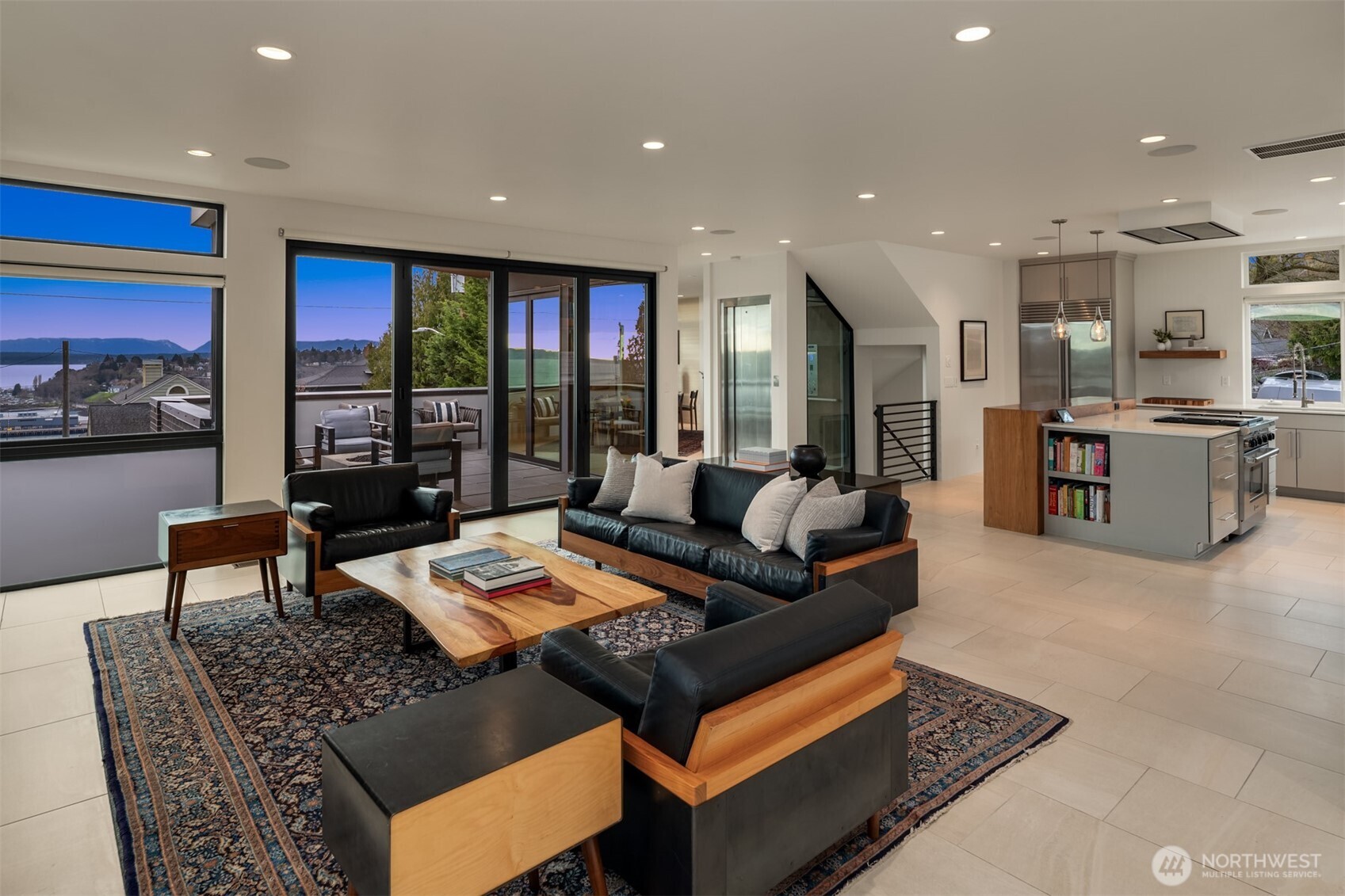 1400 Olympic Way West Seattle, WA 98119 - Photo 5 of 40 a living room with furniture and a table