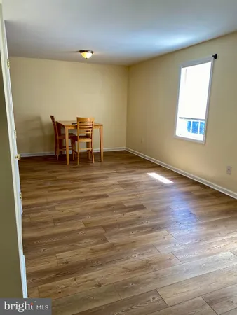 a view of a livingroom with furniture and windows