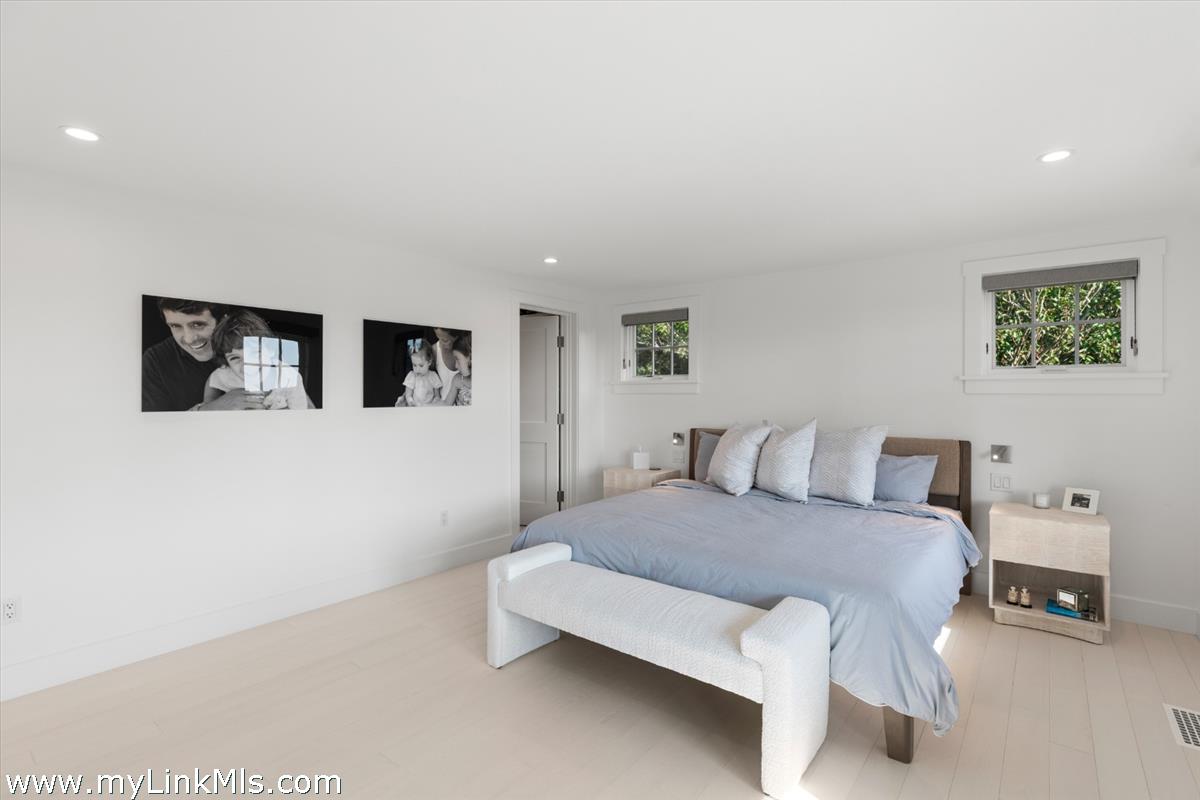 3 Tautemo Way Nantucket, MA 02554 - Photo 34 of 57 a bedroom with a bed and a night stand