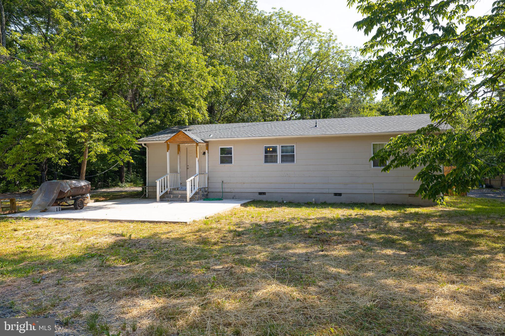 10018 Meetze Road Midland, VA 22728 - Photo 19 of 28 View of back of property with paved patio