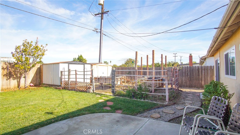911 East Evergreen Avenue Santa Maria, CA 93454 - Photo 15 of 48 a view of a garden with a slide