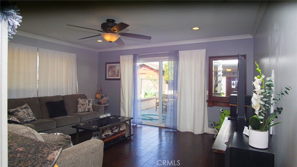 911 East Evergreen Avenue Santa Maria, CA 93454 - Photo 34 of 48 a living room with furniture and a potted plant